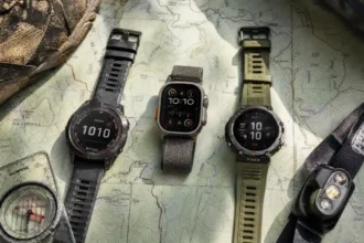 Garmin Fenix 7X, Apple Watch Ultra 2, and Amazfit T-Rex 3 side by side on a hiking map